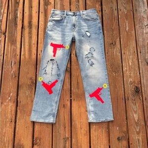 Blue and Red Straight-Leg Jeans with Artistic Distressing